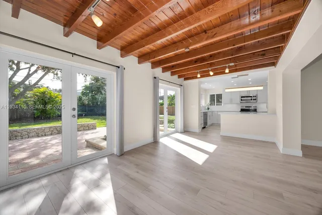 a view of entryway with wooden floor