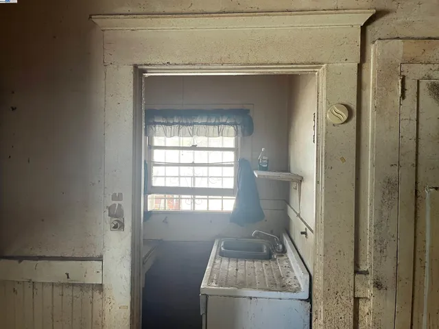a bathroom with a toilet sink and tub
