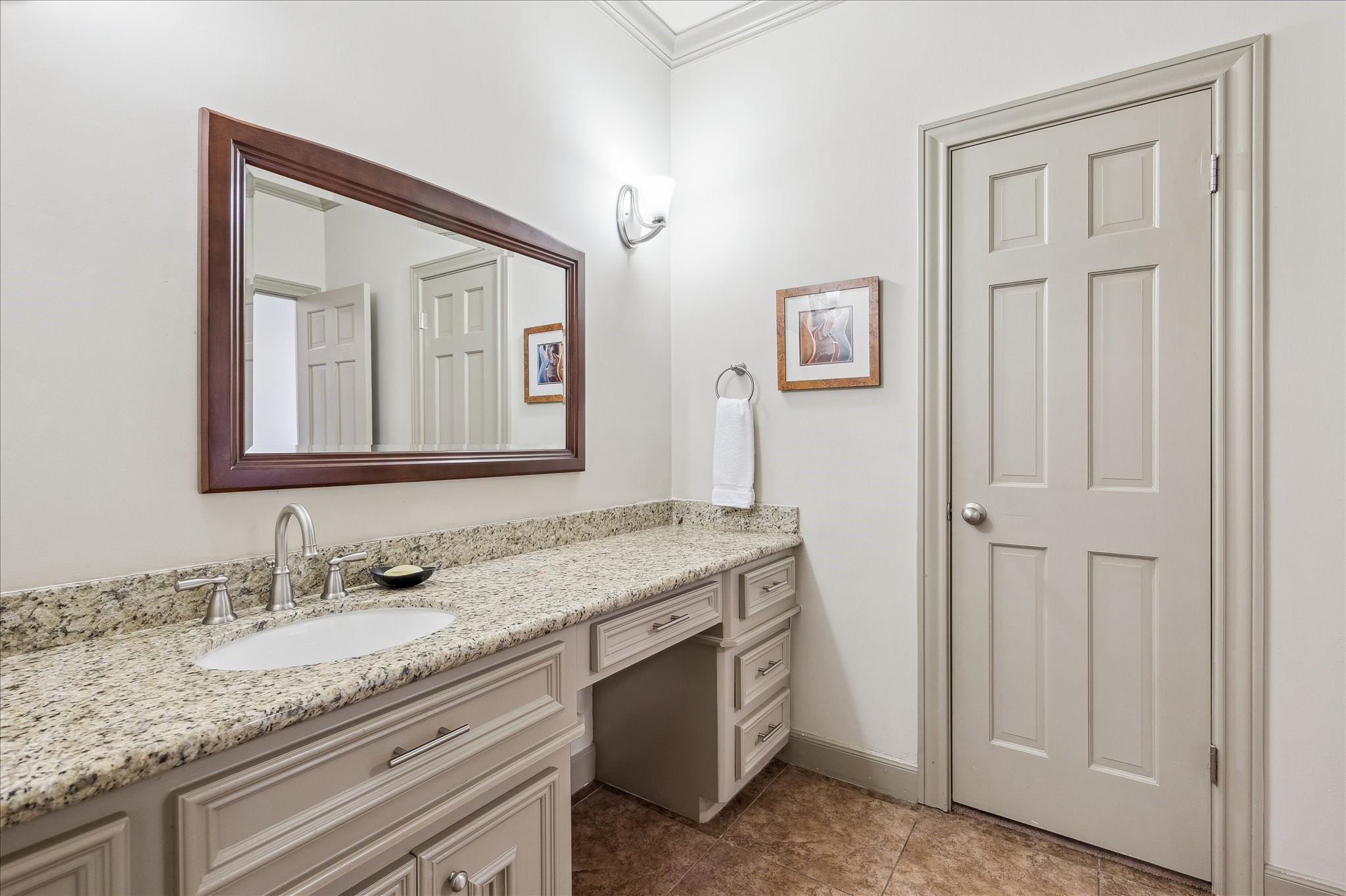 5 Lochtyne Circle Houston, TX 77024 - Photo 16 of 43 a bathroom with a granite countertop sink and a mirror