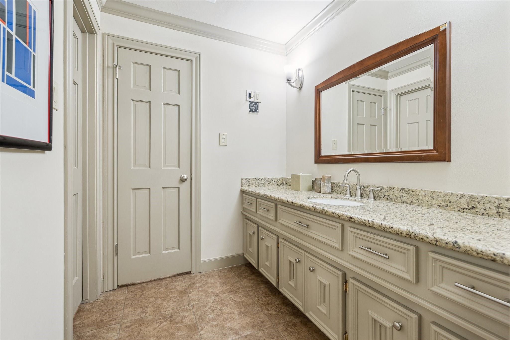 5 Lochtyne Circle Houston, TX 77024 - Photo 18 of 43 a bathroom with a granite countertop double vanity sink and a mirror