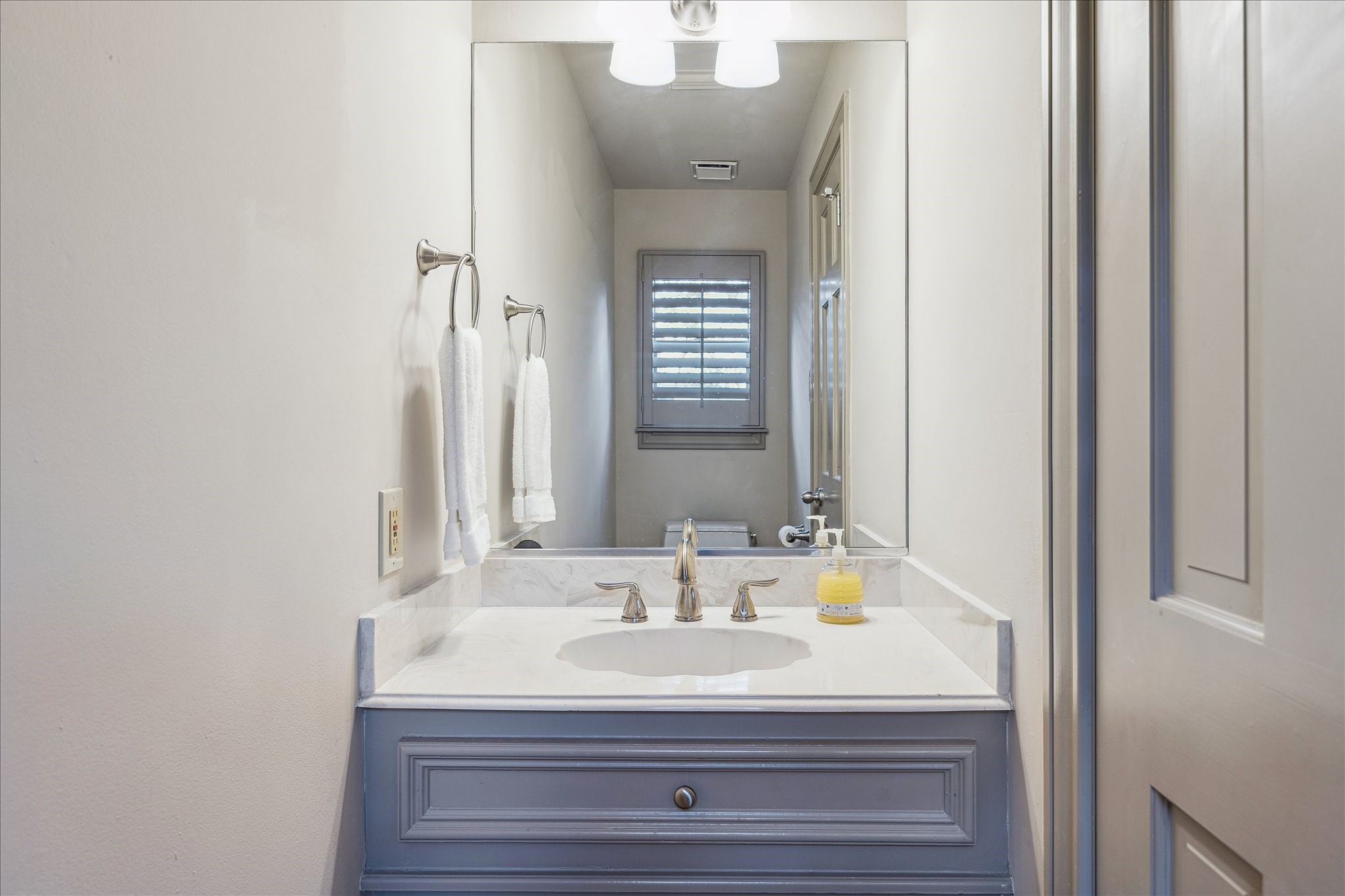 5 Lochtyne Circle Houston, TX 77024 - Photo 20 of 43 a bathroom with a sink and a mirror