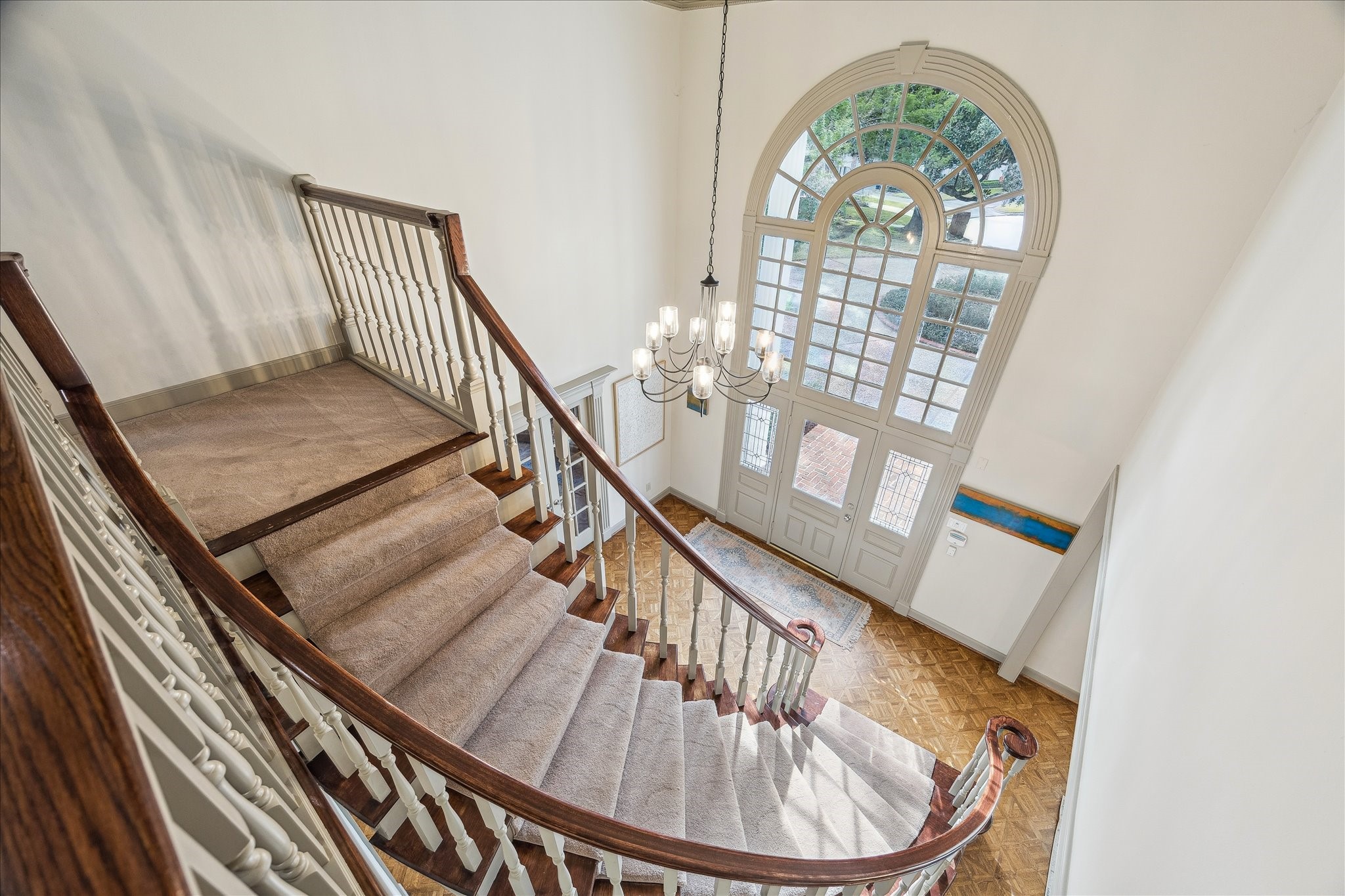 5 Lochtyne Circle Houston, TX 77024 - Photo 22 of 43 a view of an entryway with wooden floor
