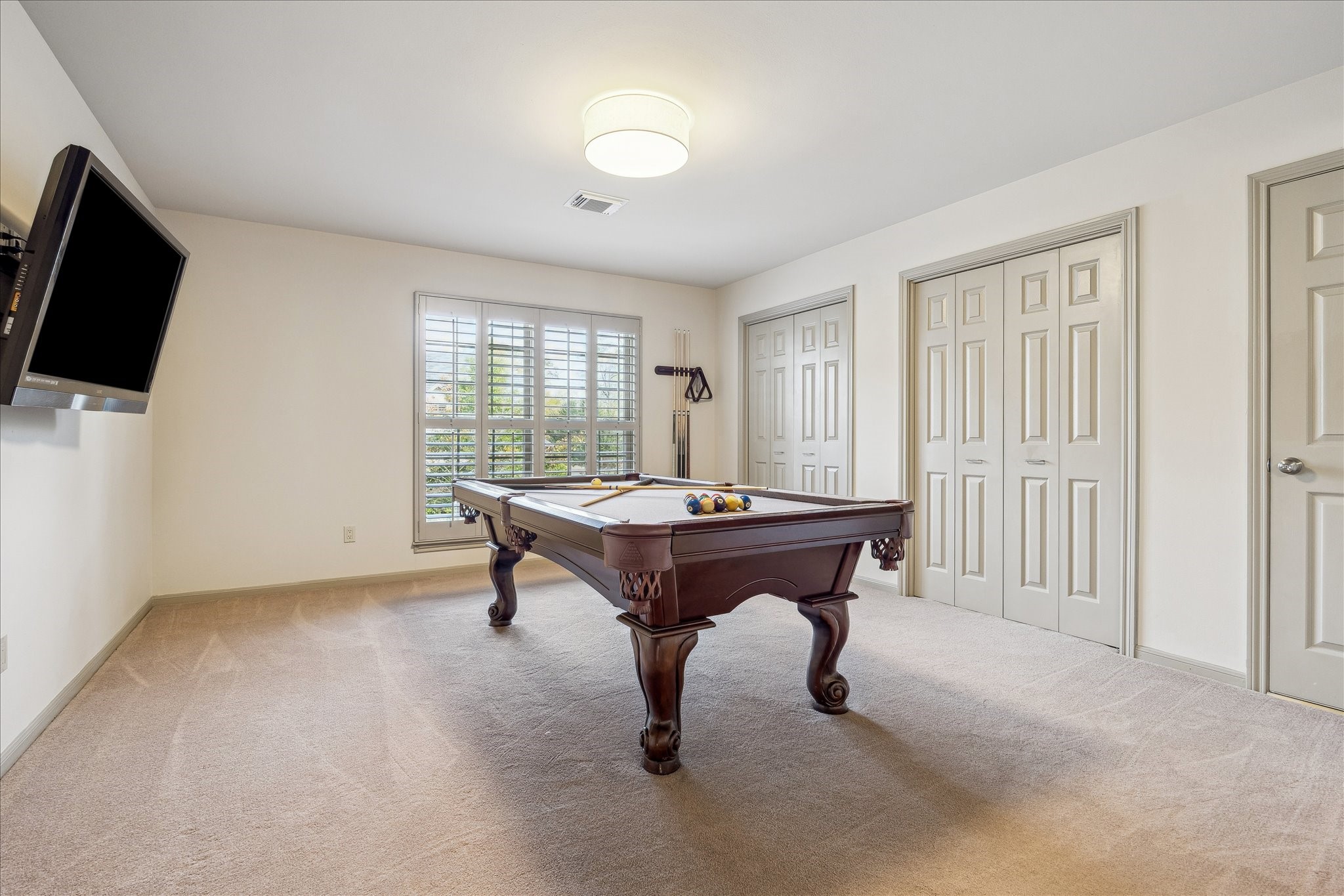 5 Lochtyne Circle Houston, TX 77024 - Photo 27 of 43 a room with pool table and windows
