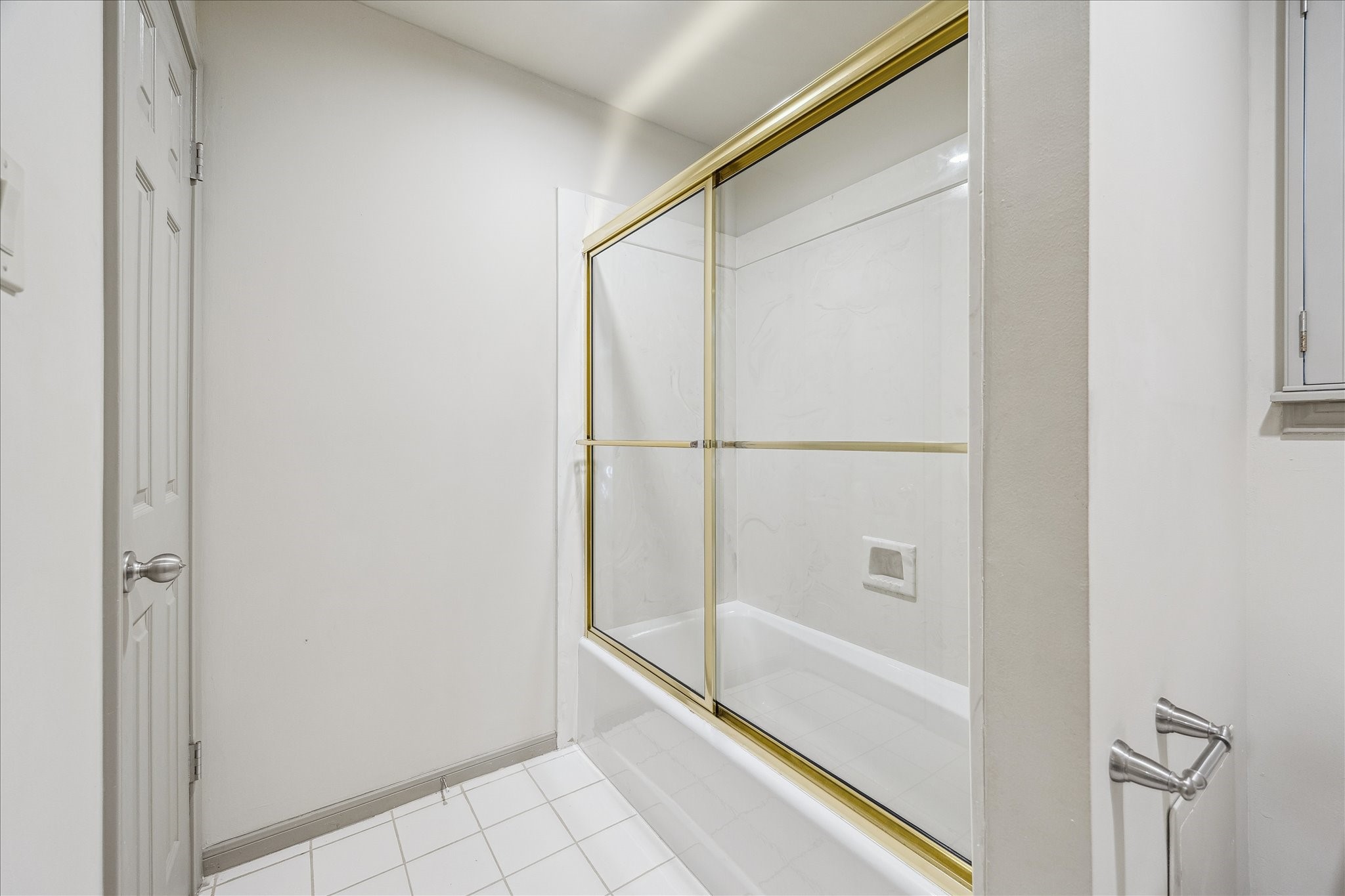 5 Lochtyne Circle Houston, TX 77024 - Photo 30 of 43 a bathroom with a bathtub and a shower