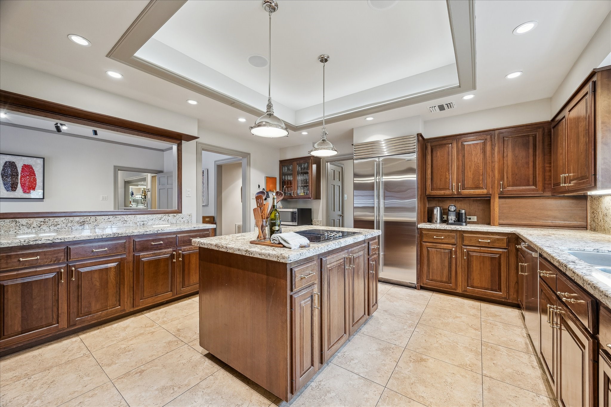 5 Lochtyne Circle Houston, TX 77024 - Photo 8 of 43 a kitchen with a stove sink and cabinets