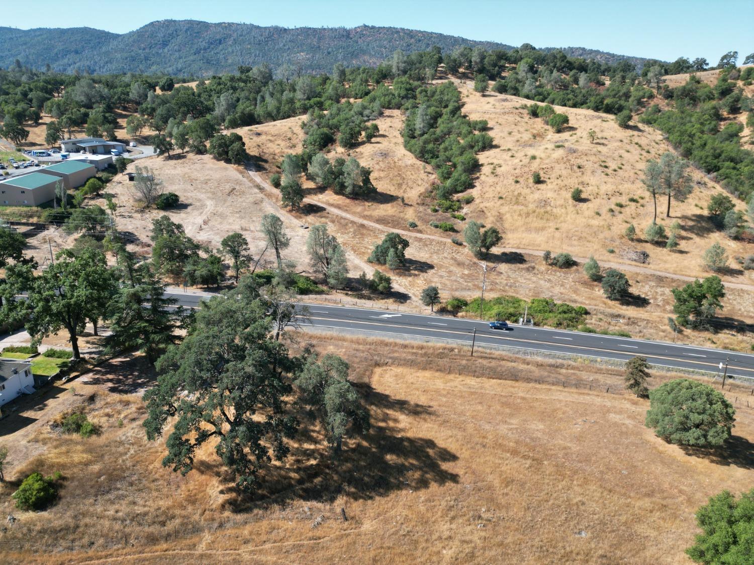 747 Garbarini Road San Andreas, CA 95249 - Photo 8 of 8 a view of a lake with a mountain