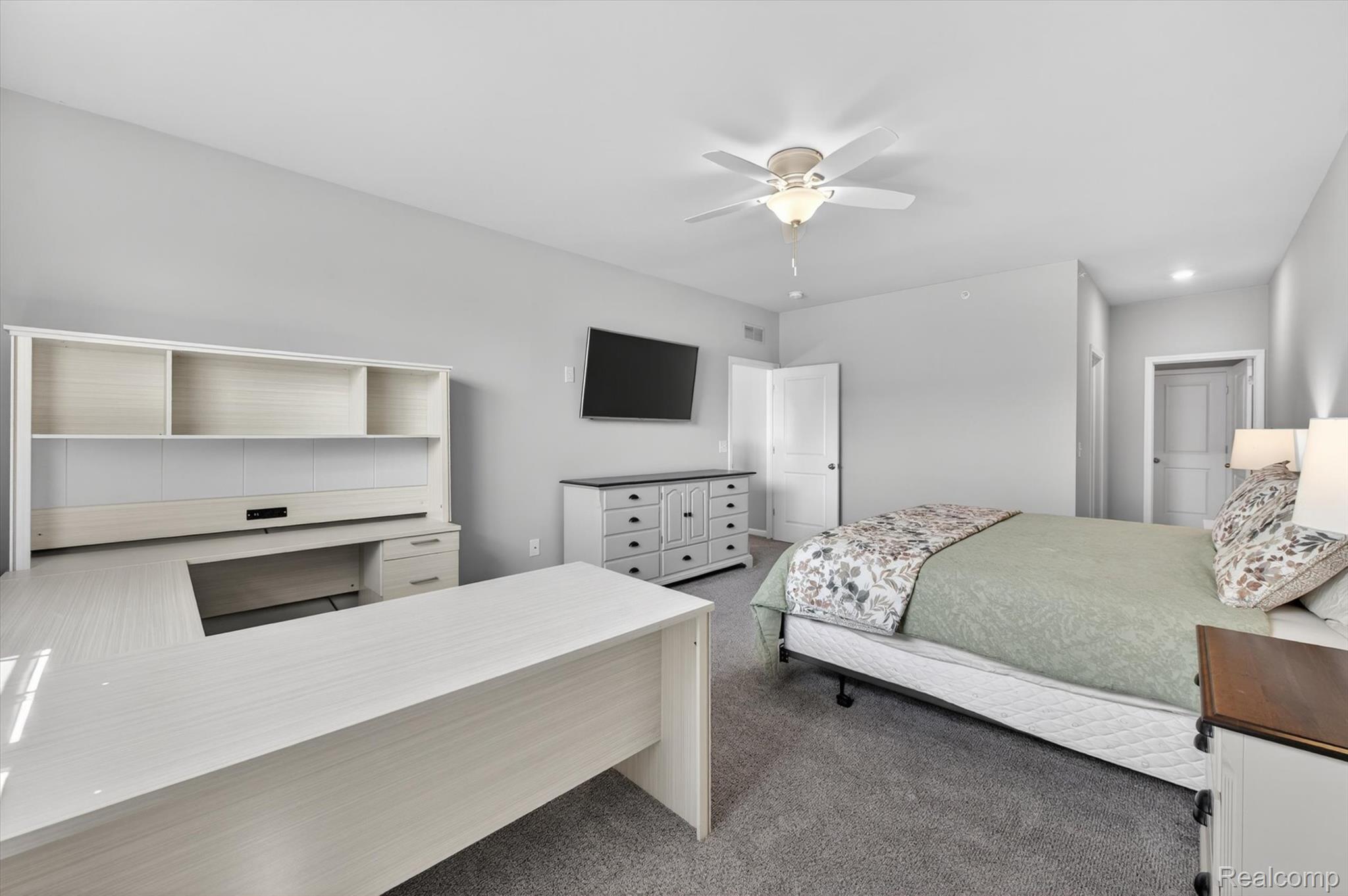 9789 Ridge Run Street Howell, MI 48855 - Photo 15 of 23 Expansive primary suite.