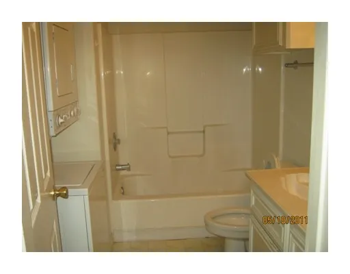 a front view of a house with glass windows