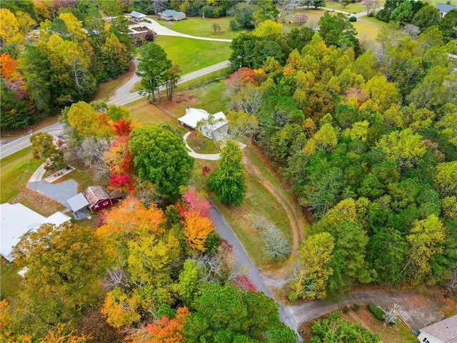 a view of swimming pool with a yard
