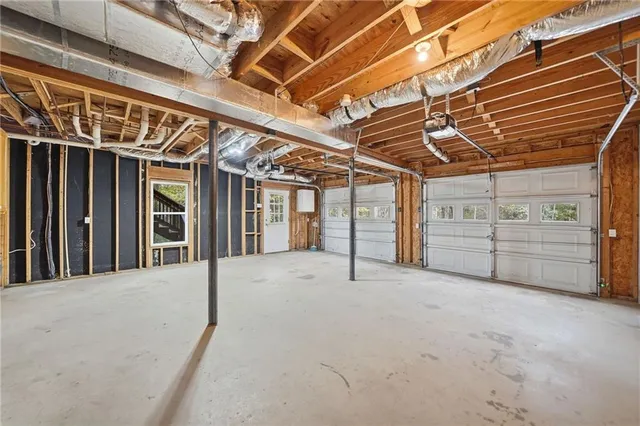 a view of a room with a air conditioner and a window