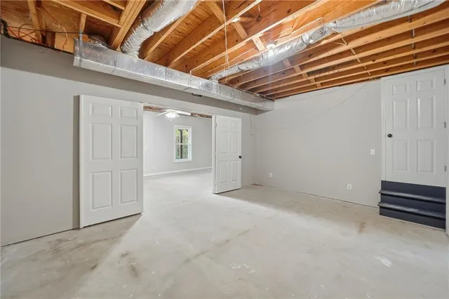 a view of a porch with wooden floor and fence