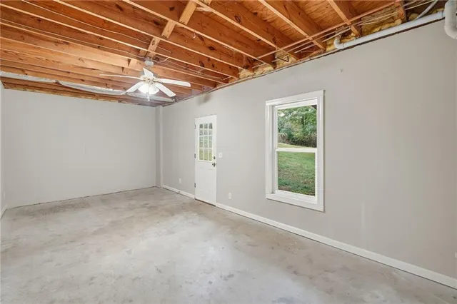 a backyard of a house with lots of green space