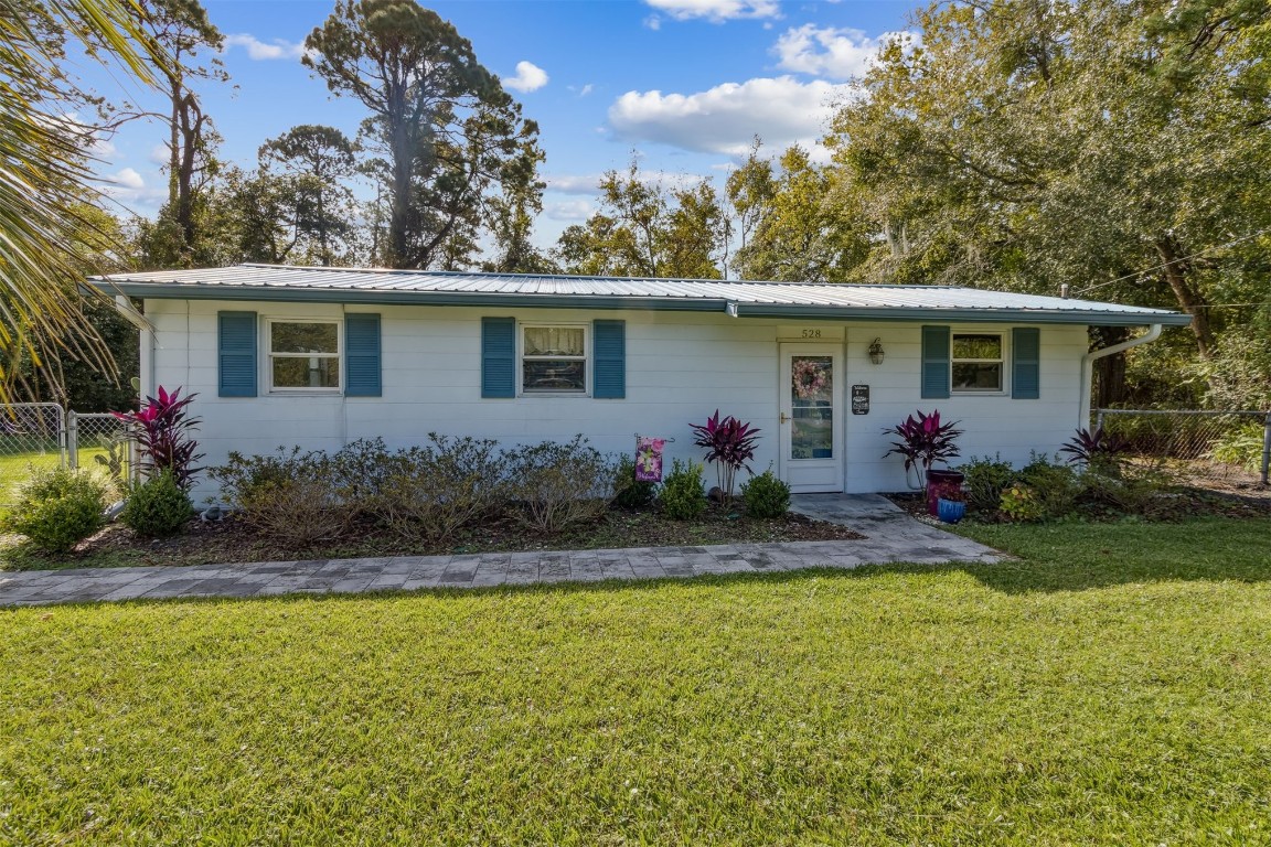 528 Sunset Road Fernandina Beach, FL 32034 - Photo 1 of 19 528 Sunset Rd welcomes you with cute curb appeal!