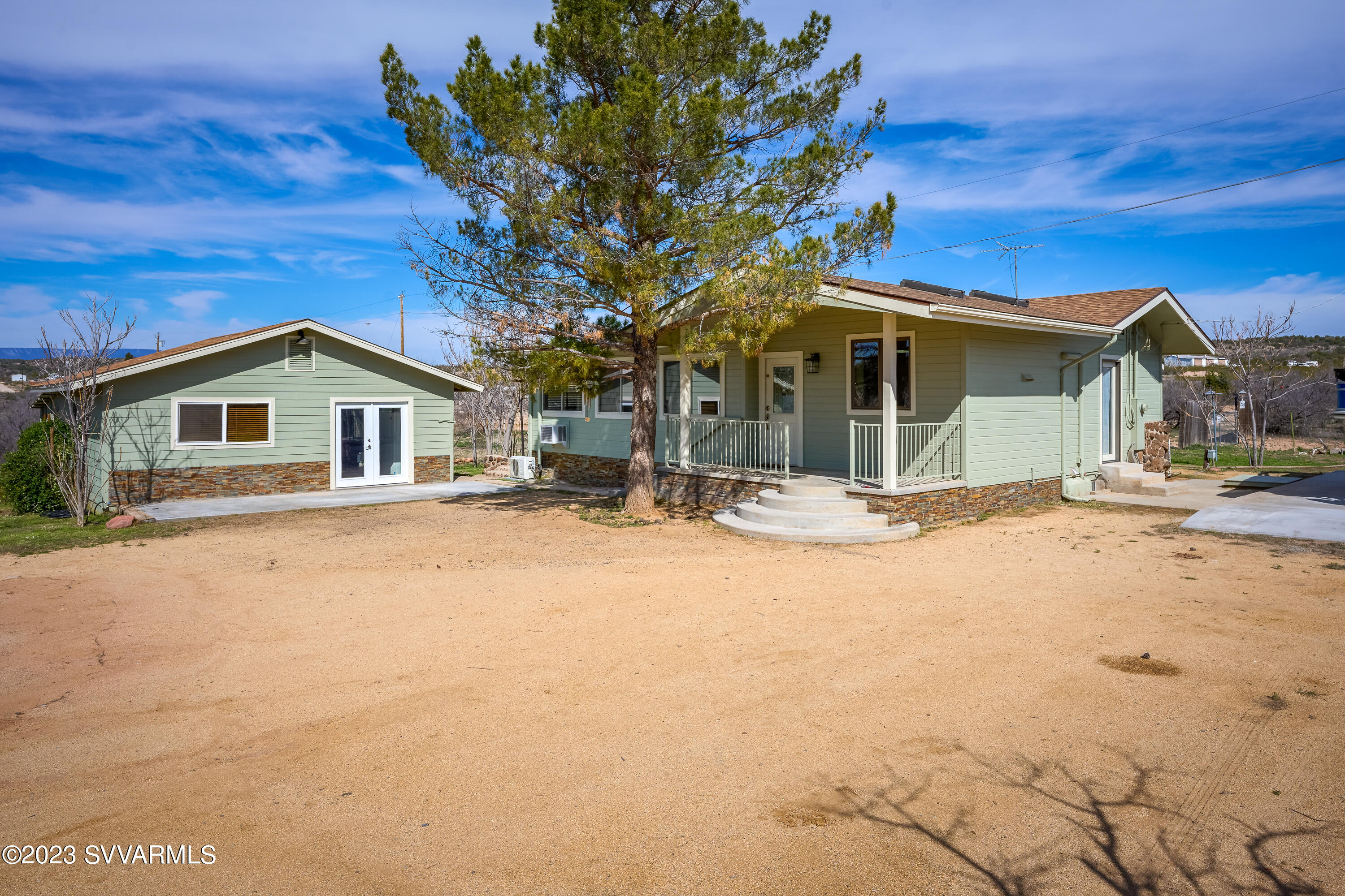 6034 Bice Road Rimrock, AZ 86335 - Photo 11 of 47 a view of a house with snow on the road