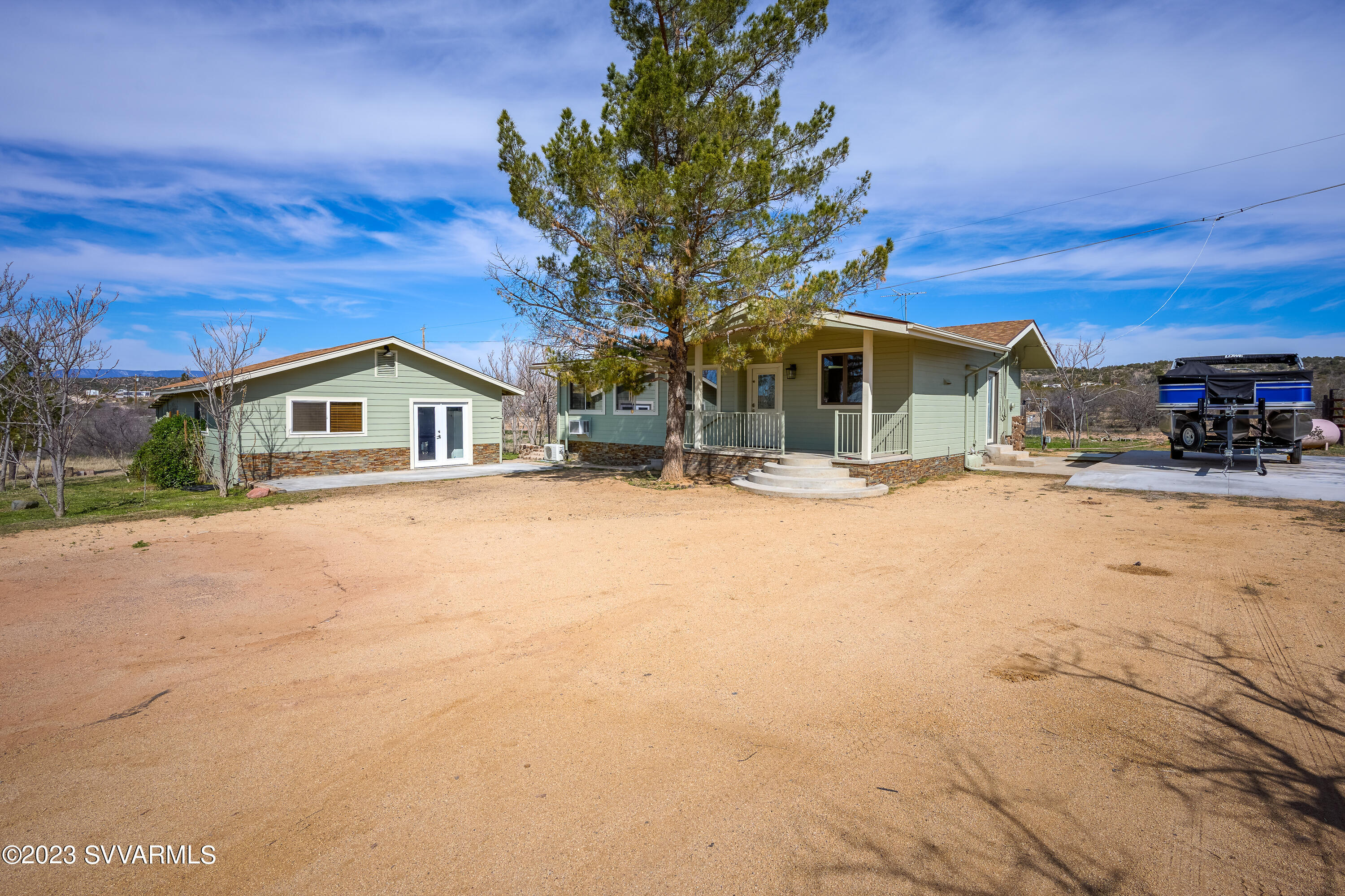6034 Bice Road Rimrock, AZ 86335 - Photo 12 of 47 a view of a house with snow on the road