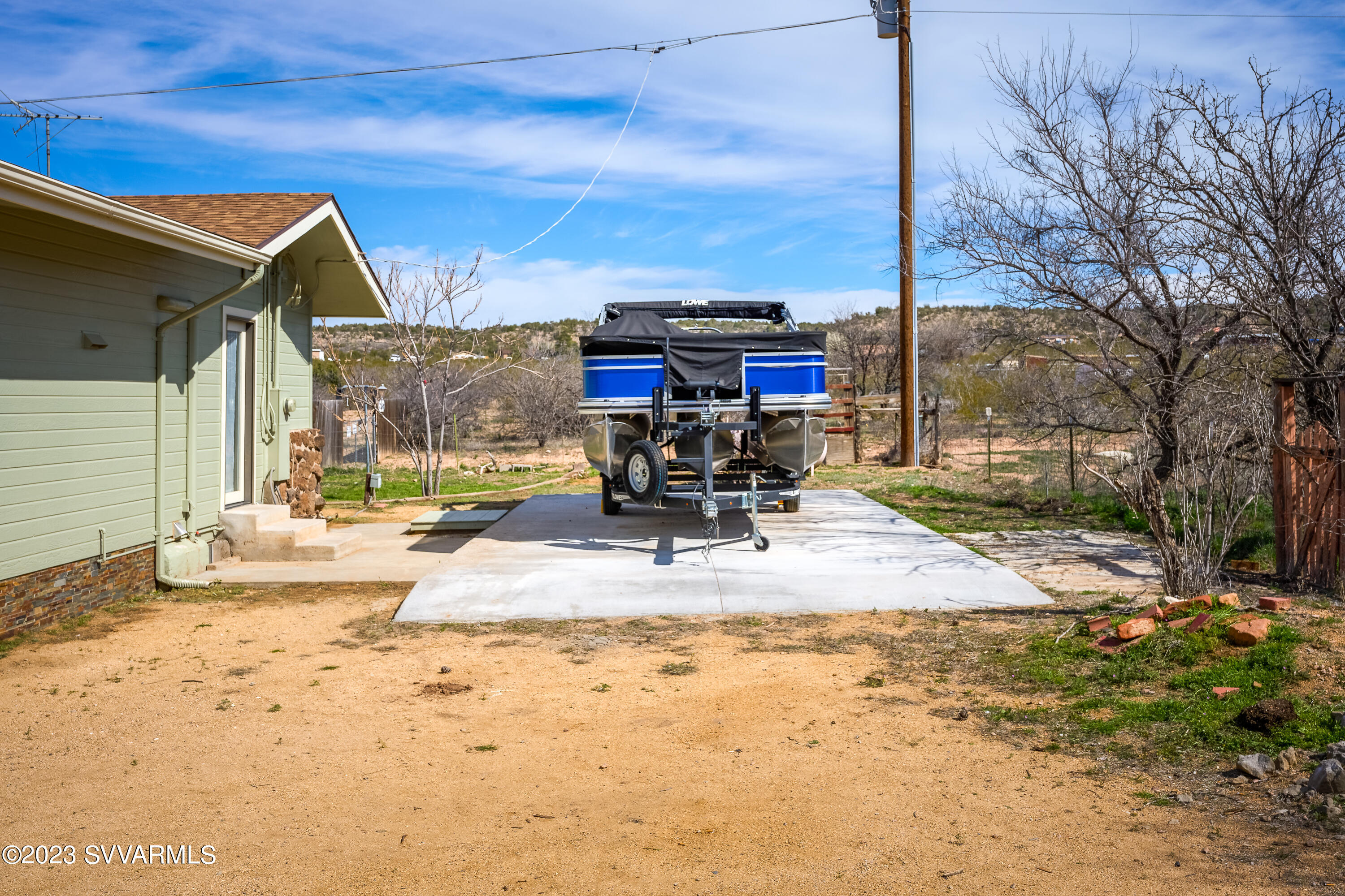6034 Bice Road Rimrock, AZ 86335 - Photo 13 of 47 a view of a patio with a table and chairs