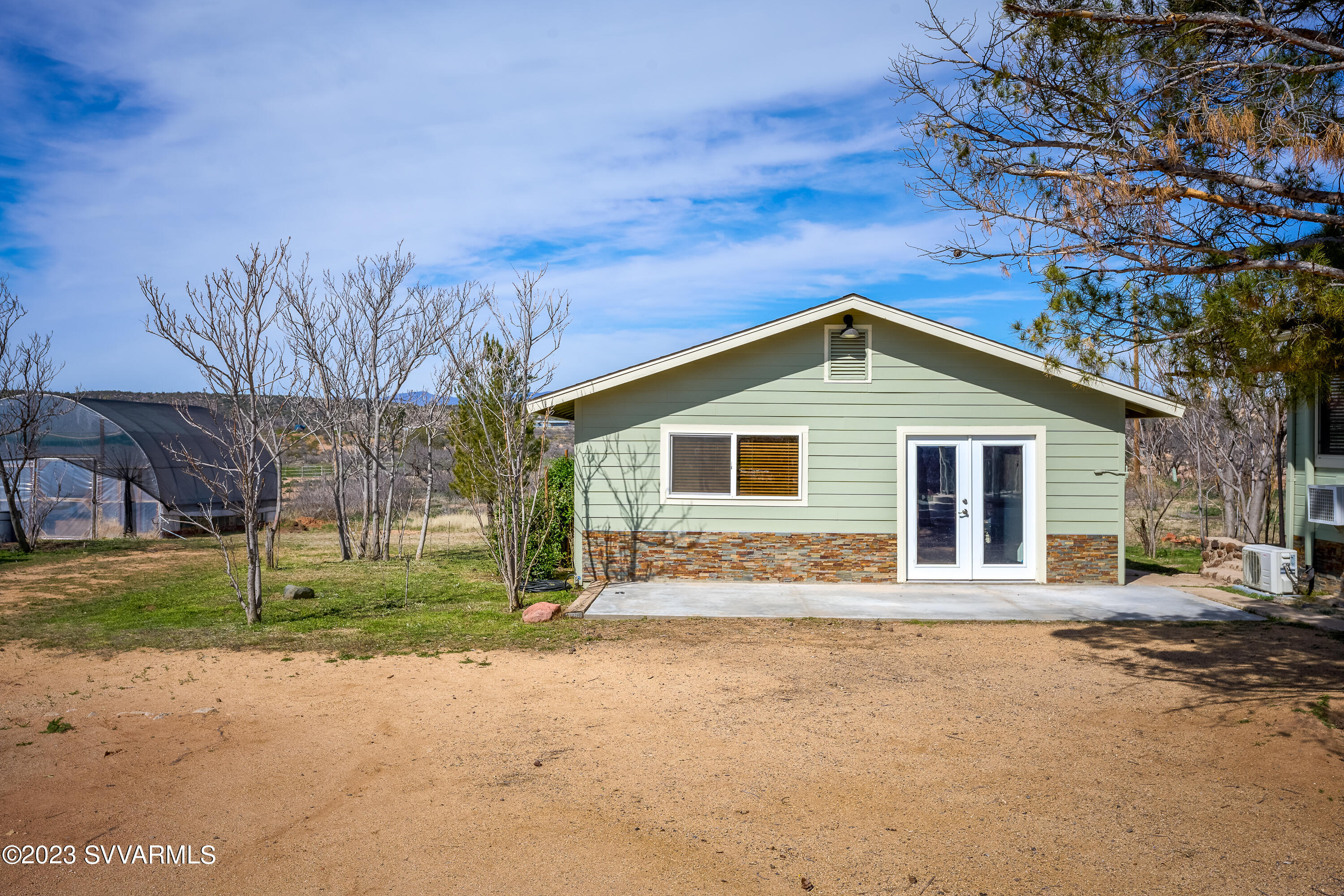 6034 Bice Road Rimrock, AZ 86335 - Photo 14 of 47 a front view of a house with a yard