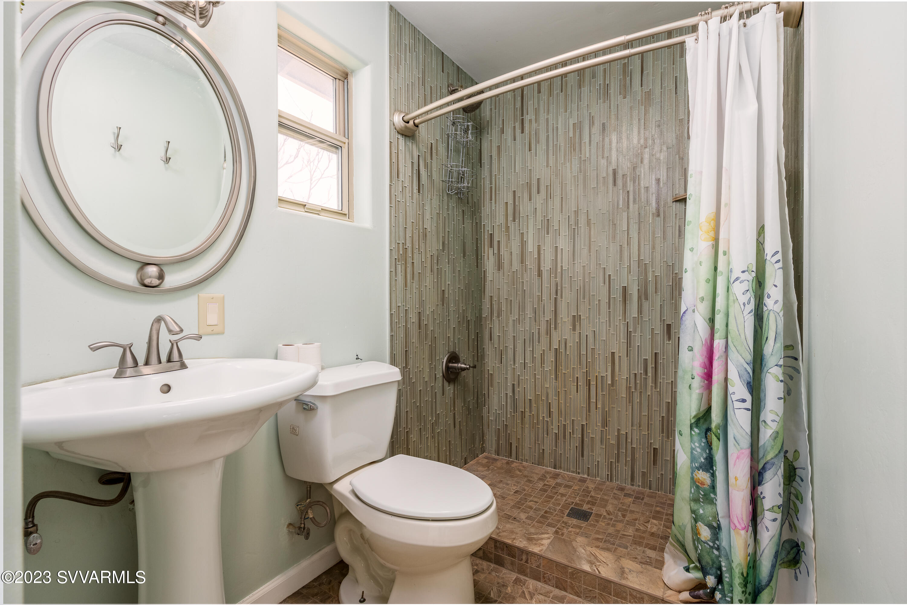 6034 Bice Road Rimrock, AZ 86335 - Photo 26 of 47 a bathroom with a sink a toilet and a mirror