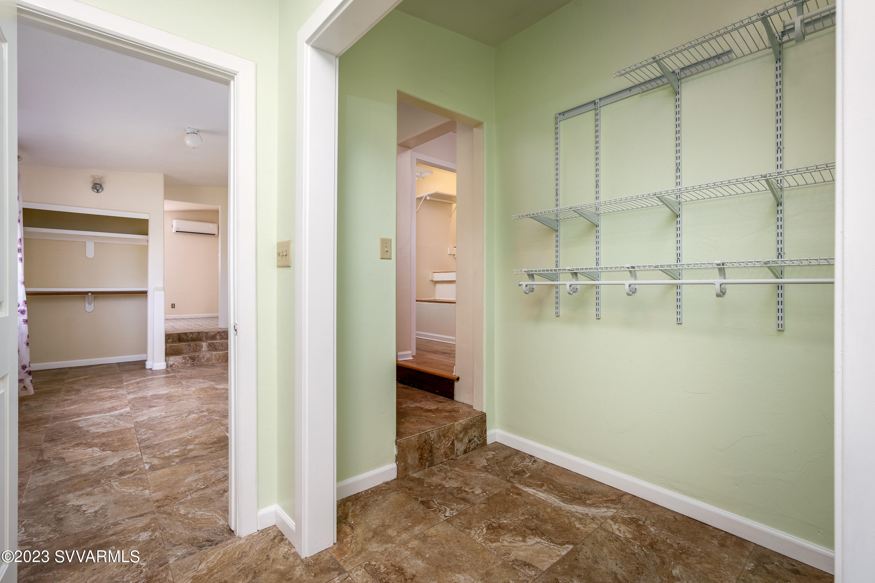 6034 Bice Road Rimrock, AZ 86335 - Photo 32 of 47 view of an empty room with a bathroom and a mirror