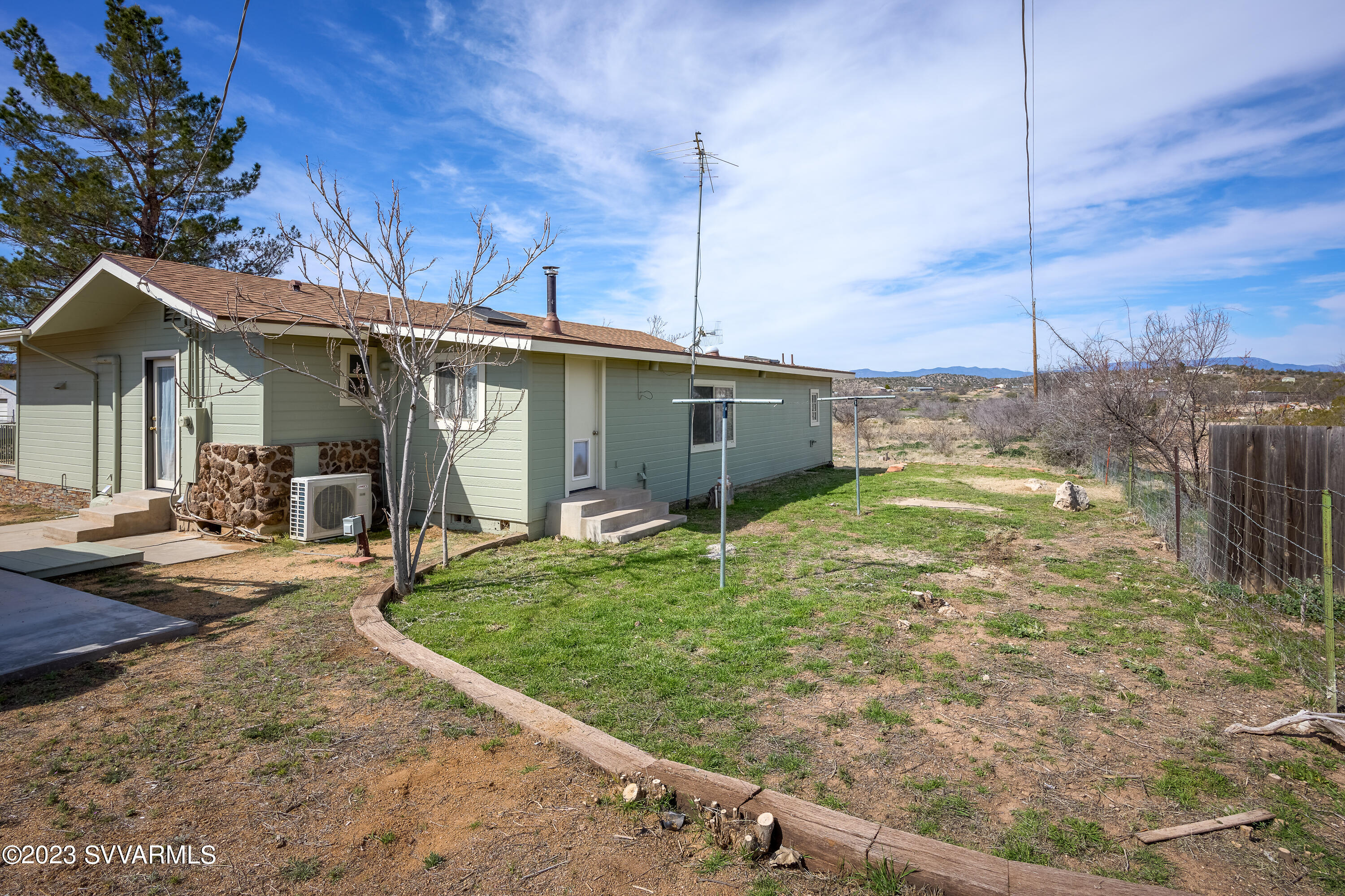 6034 Bice Road Rimrock, AZ 86335 - Photo 41 of 47 a view of a house with backyard and porch