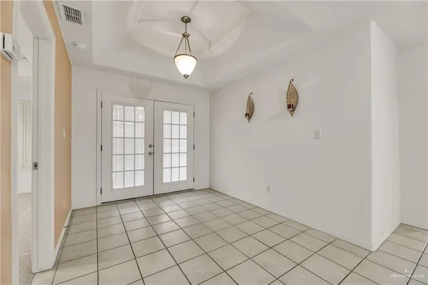 a view of an empty room and window