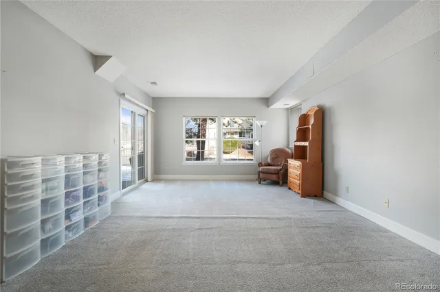 a view of livingroom with furniture and windows