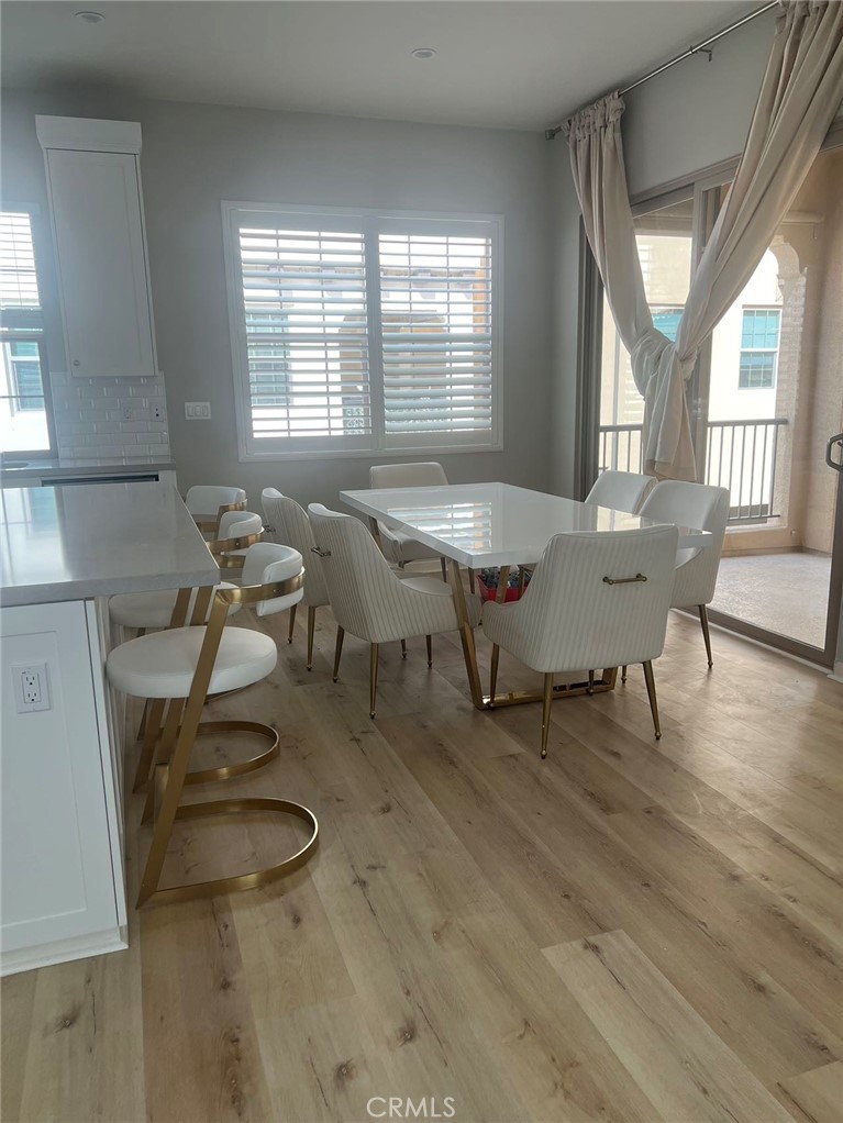 232 Milky Way Irvine, CA 92618 - Photo 1 of 1 a living room with furniture and wooden floor