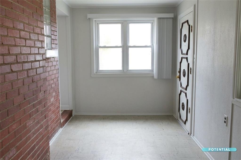 825 Liberty Street Duquesne, PA 15110 - Photo 23 of 25 a view of an empty room with a window