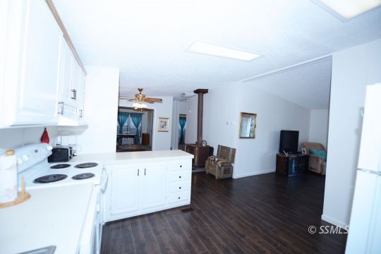 208 Charity Road Caliente, CA 93518 - Photo 8 of 47 a living room with furniture and a wooden floor
