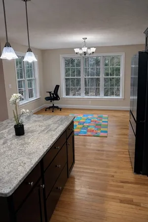 a kitchen with counter top space and stainless steel appliances