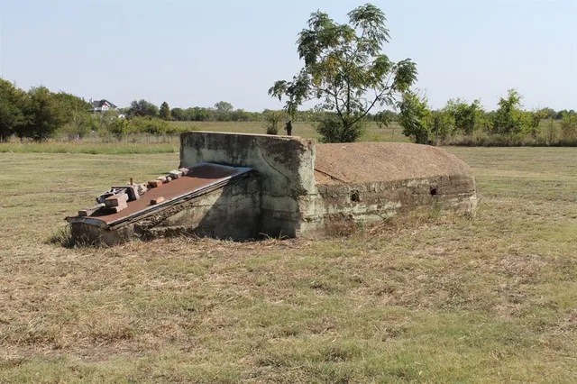 an aerial view of a house with lake view