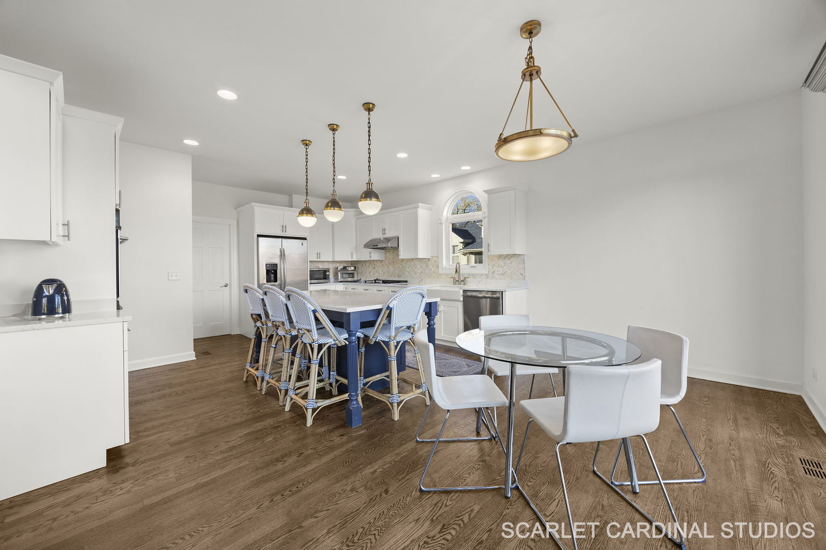 5125 Radcliff Road Lisle, IL 60532 - Photo 14 of 37 a view of a dining room with furniture wooden floor and a chandelier