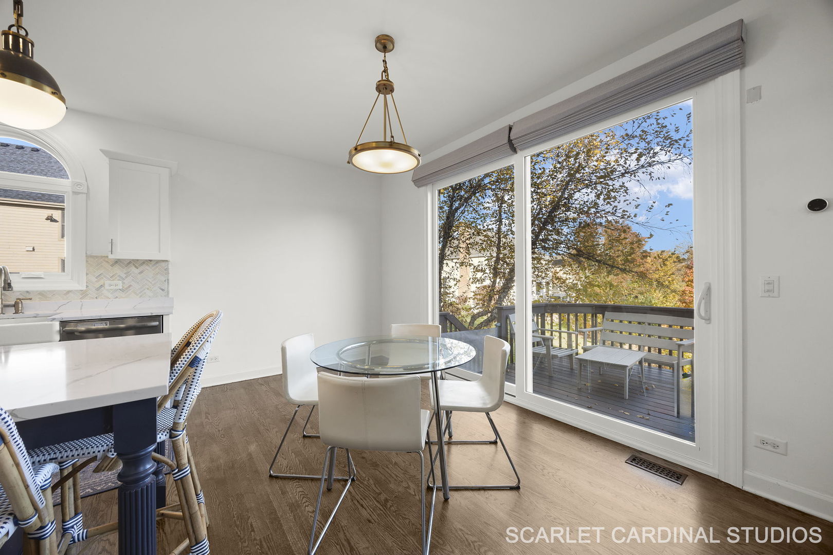 5125 Radcliff Road Lisle, IL 60532 - Photo 15 of 37 a dining room with furniture a chandelier and wooden floor