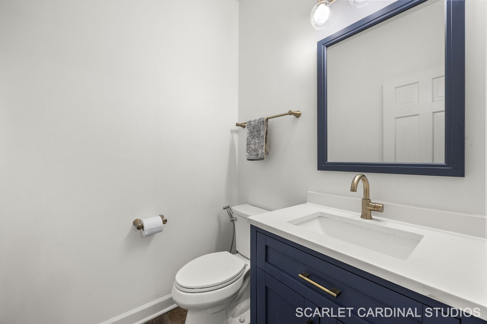 5125 Radcliff Road Lisle, IL 60532 - Photo 17 of 37 a bathroom with a sink toilet and mirror
