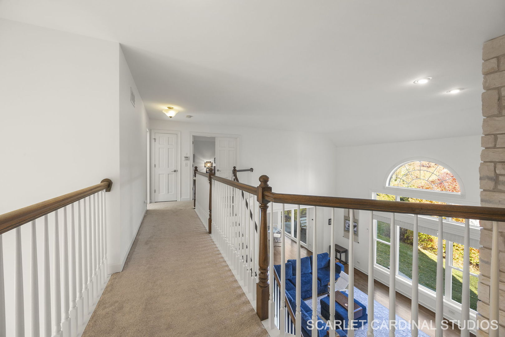 5125 Radcliff Road Lisle, IL 60532 - Photo 25 of 37 a view of a hallway with wooden floor and stairs