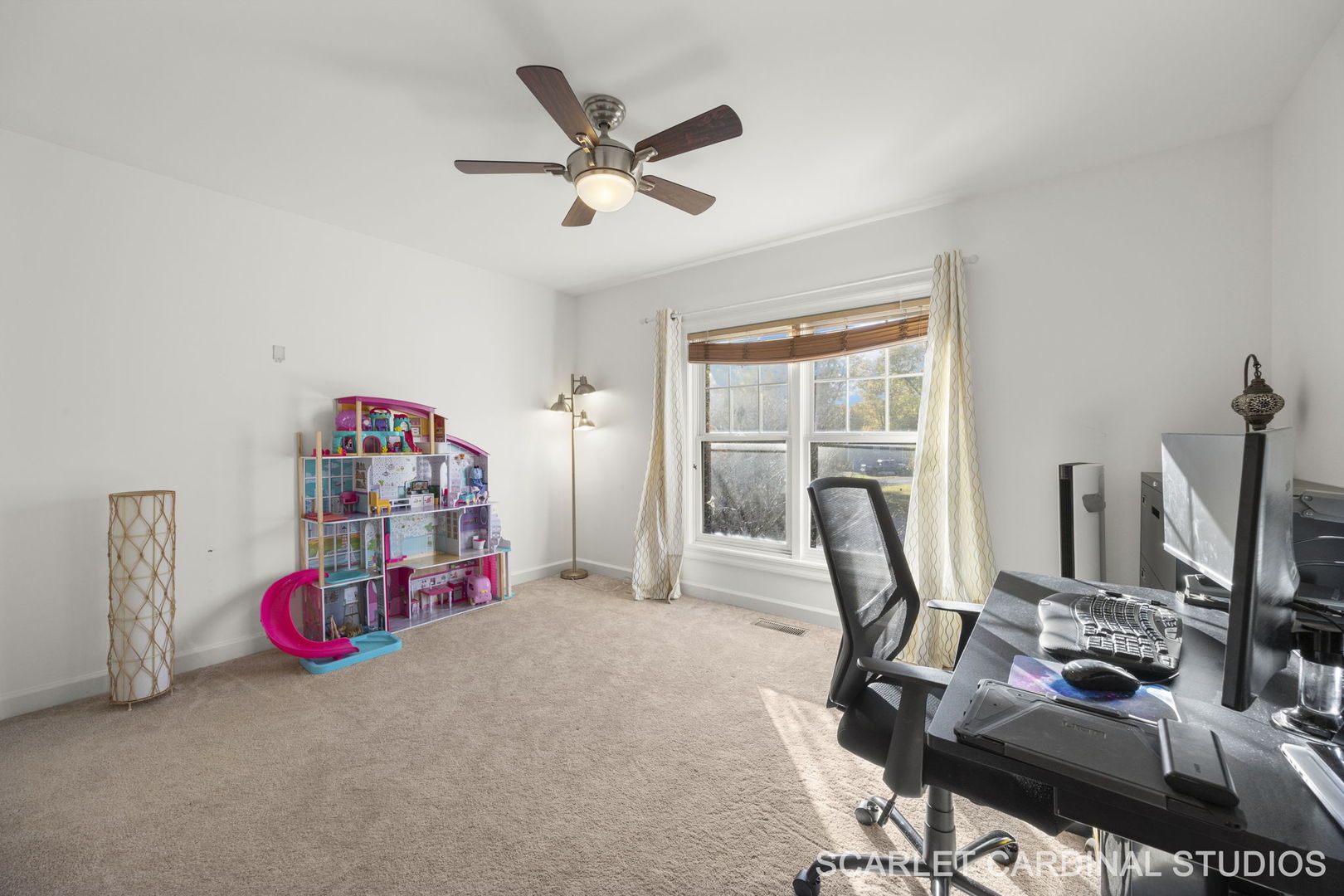 5125 Radcliff Road Lisle, IL 60532 - Photo 26 of 37 a view of a workspace with furniture and a flat screen tv