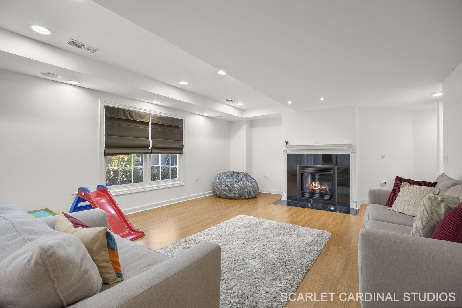 5125 Radcliff Road Lisle, IL 60532 - Photo 30 of 37 a living room with furniture and a fireplace