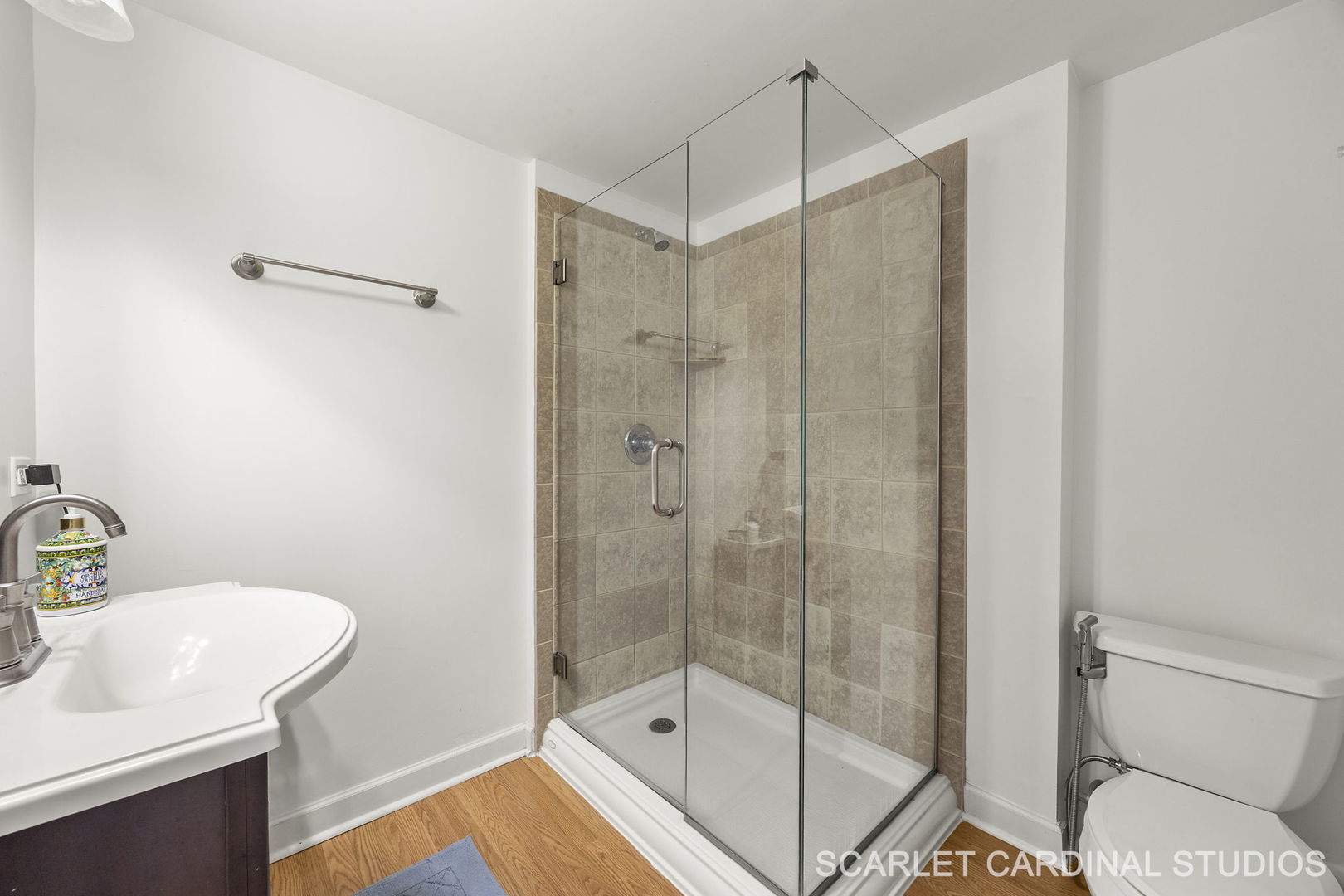 5125 Radcliff Road Lisle, IL 60532 - Photo 32 of 37 a bathroom with a shower a sink and toilet