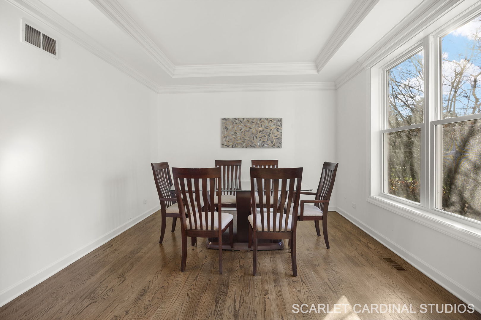 5125 Radcliff Road Lisle, IL 60532 - Photo 6 of 37 a view of a dining room with furniture wooden floor and a potted plant