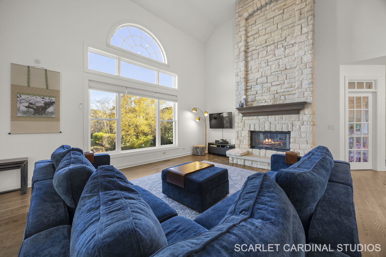 5125 Radcliff Road Lisle, IL 60532 - Photo 8 of 37 a living room with fireplace furniture and a large window