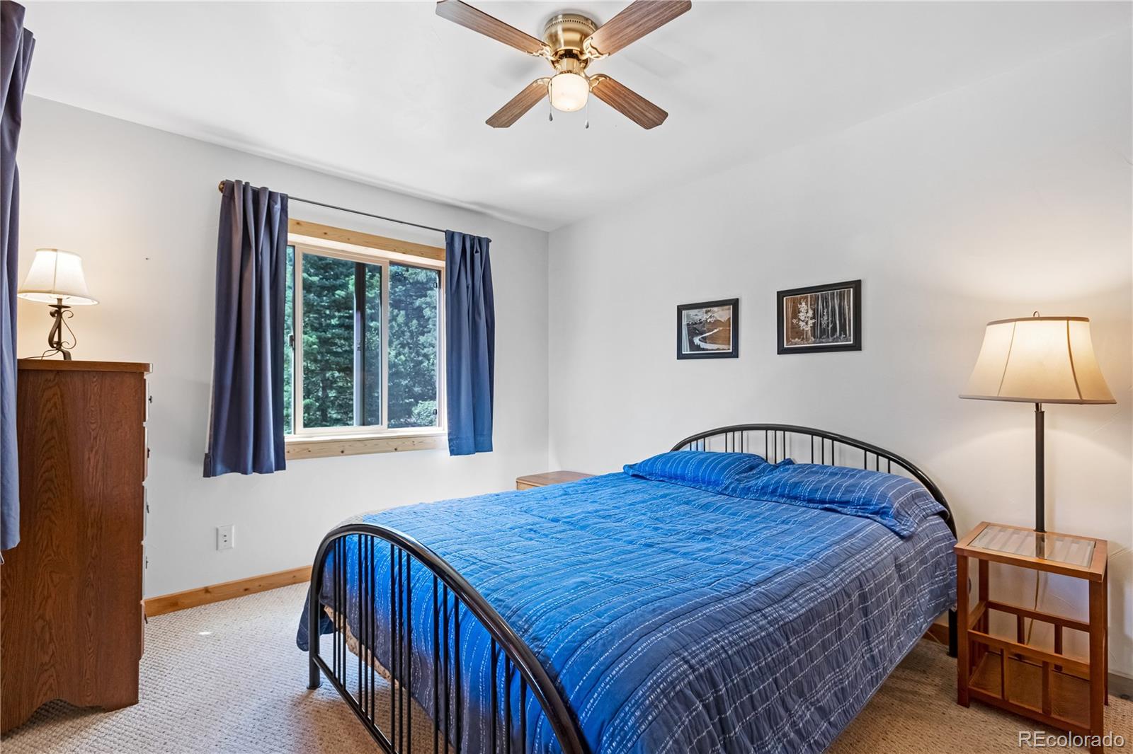 83 Forest Lane Howard, CO 81233 - Photo 19 of 43 a bedroom with a bed and window