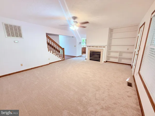 a view of a livingroom with a staircase