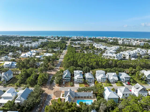 an aerial view of residential building with parking space