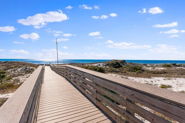 a view of a balcony with an ocean view