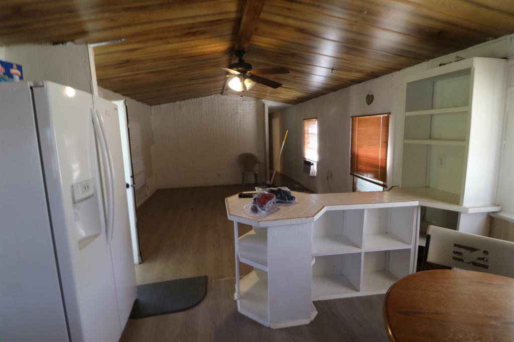 14641 Songbird Lane Haslet, TX 76052 - Photo 19 of 25 a room with furniture and a chandelier