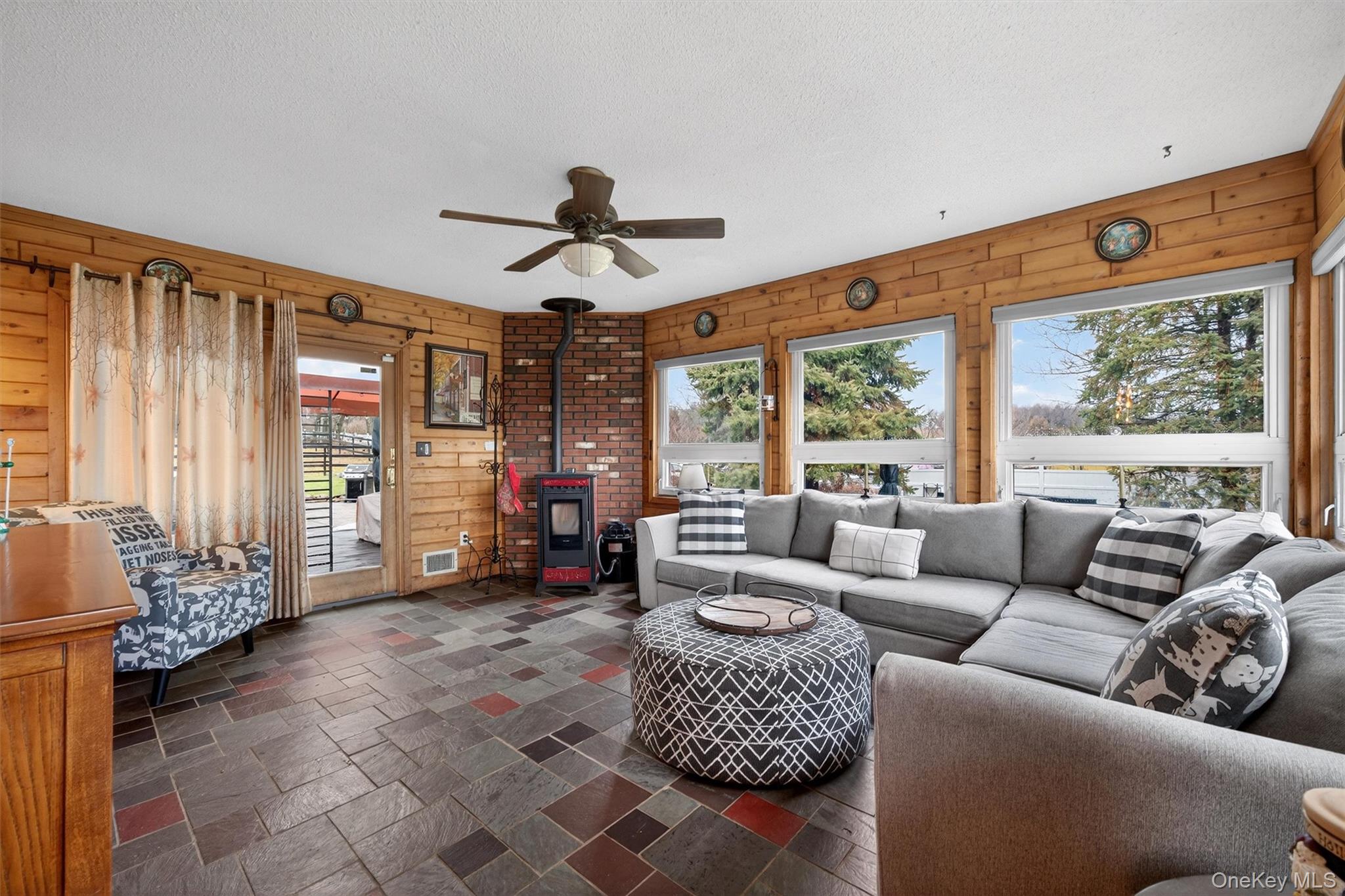65 Bailey Road New Hampton, NY 10958 - Photo 18 of 50 a living room with furniture and large windows