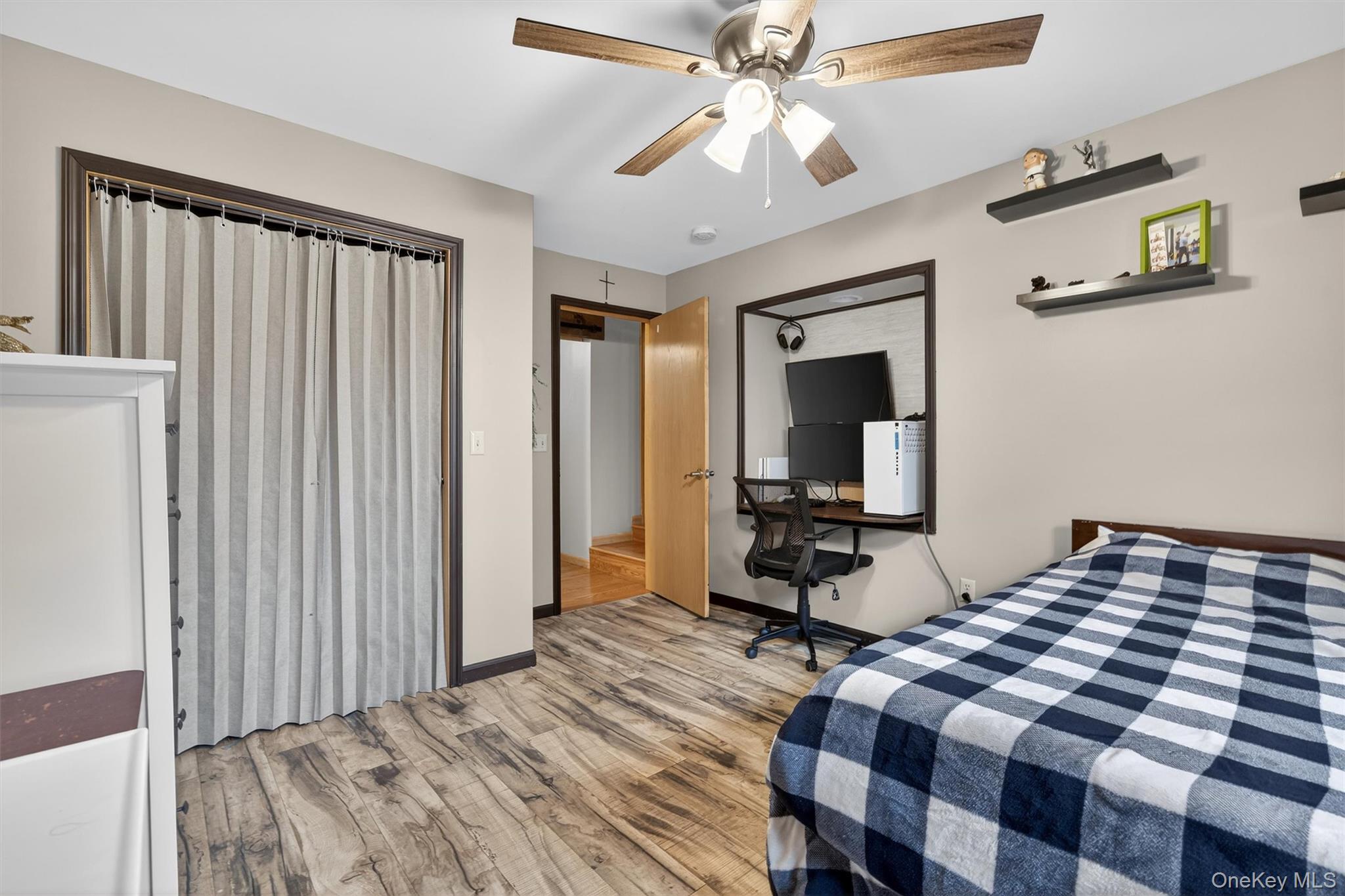65 Bailey Road New Hampton, NY 10958 - Photo 29 of 50 a bedroom with a bed and wooden floor