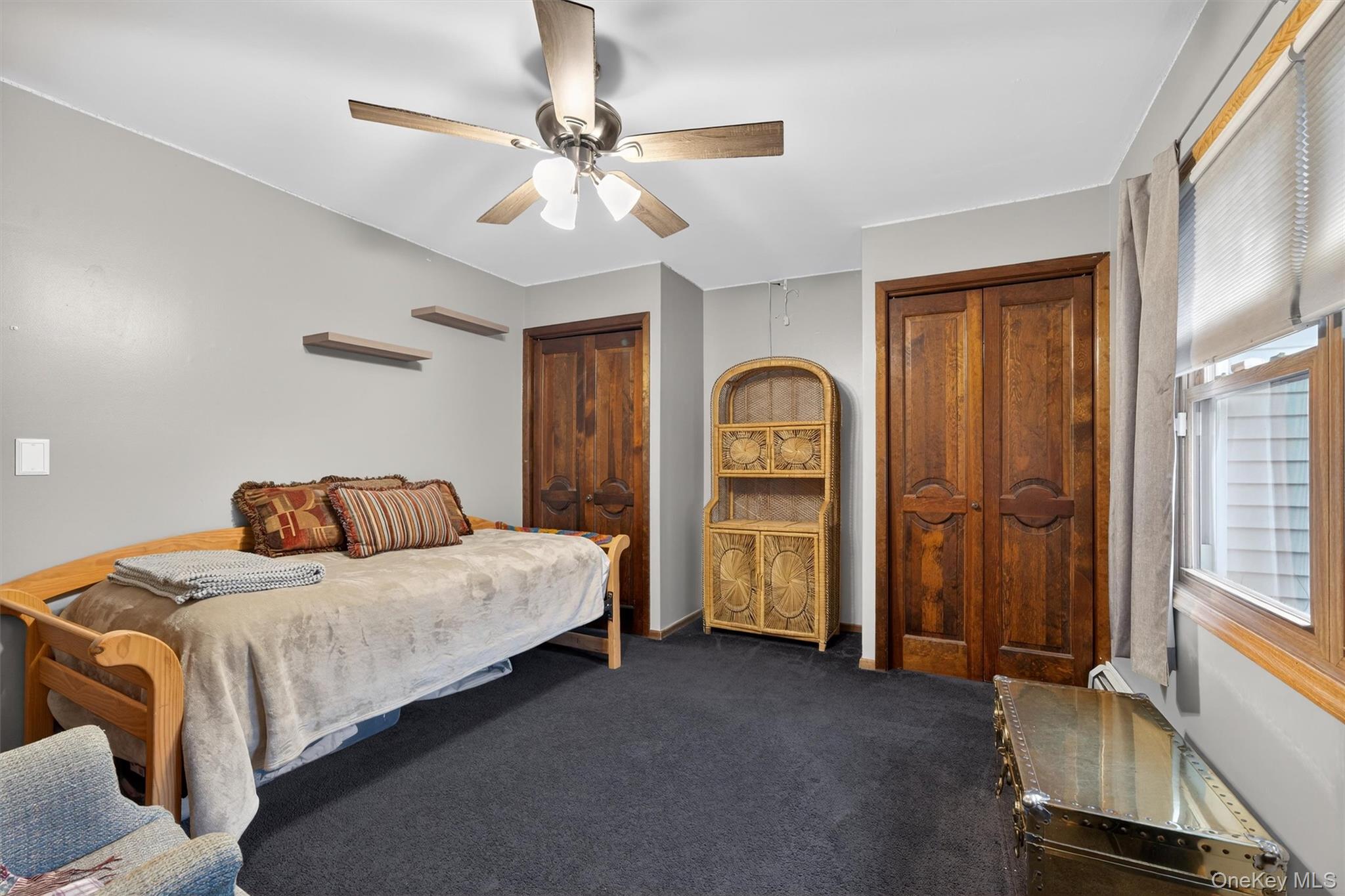 65 Bailey Road New Hampton, NY 10958 - Photo 34 of 50 Bedroom with multiple closets, dark carpet, and ceiling fan
