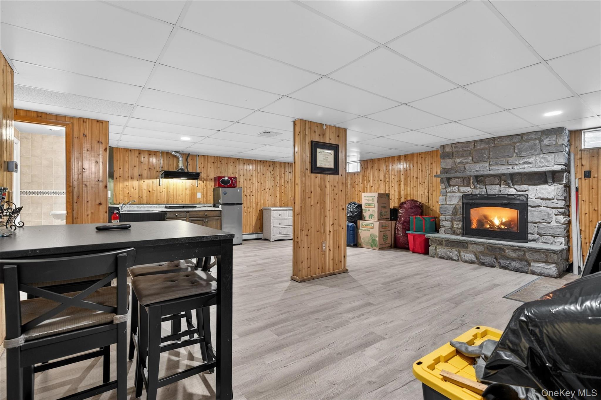 65 Bailey Road New Hampton, NY 10958 - Photo 38 of 50 a living room with furniture a flat screen tv and a fireplace