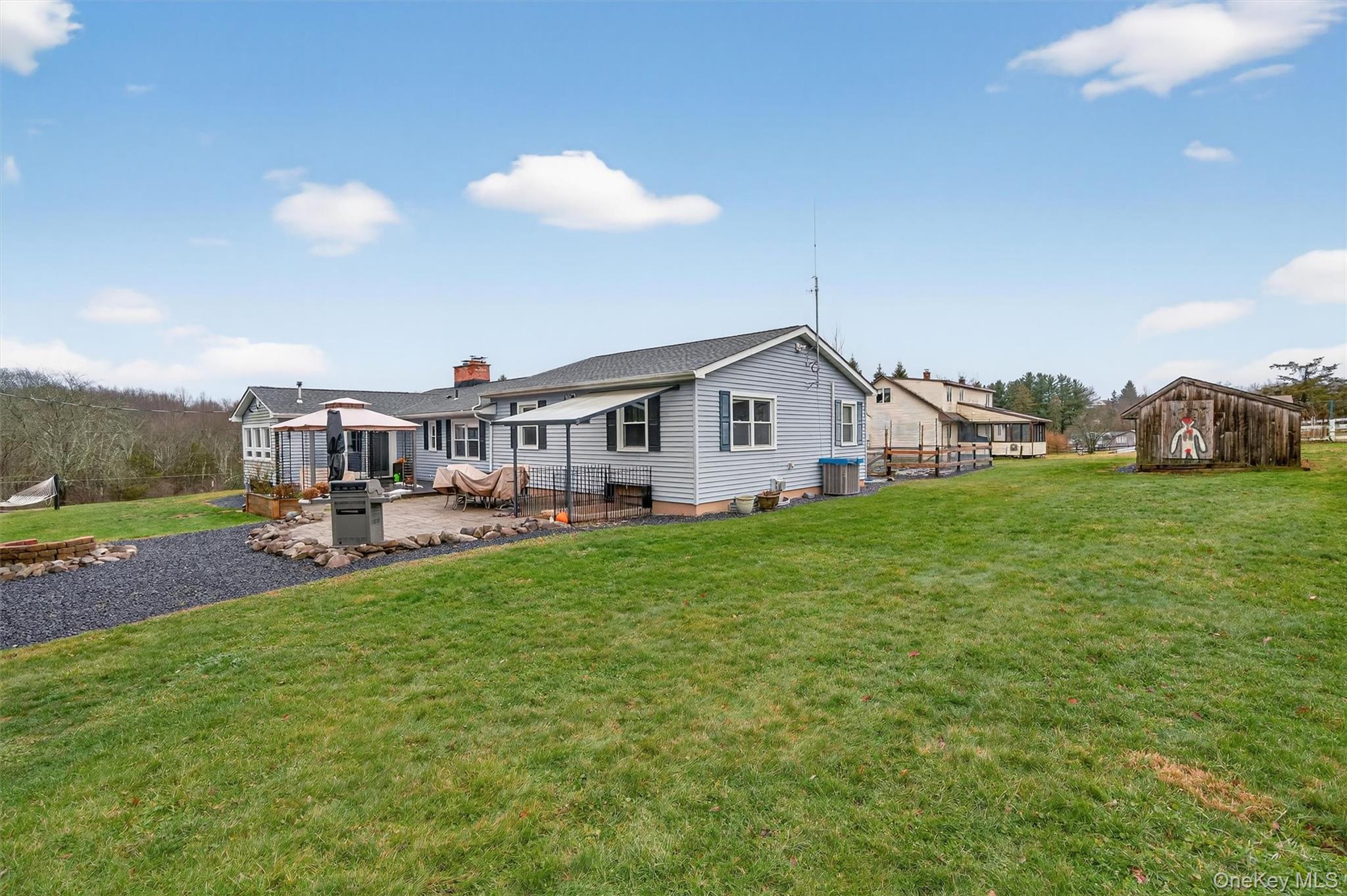 65 Bailey Road New Hampton, NY 10958 - Photo 46 of 50 a view of a house with backyard